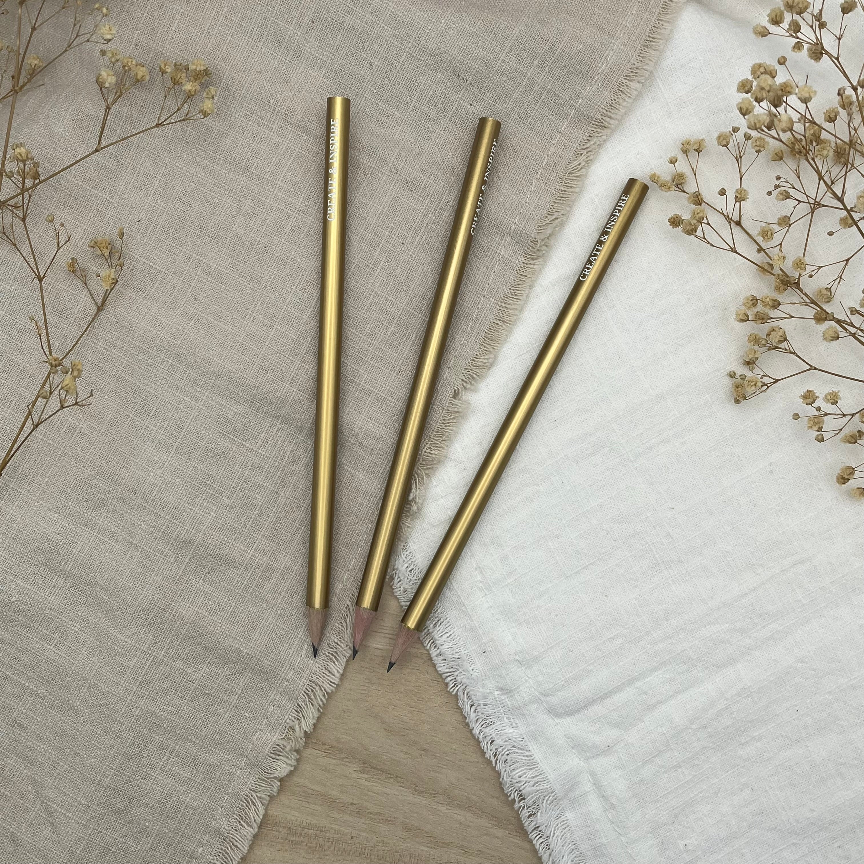 Bleistift mit Aufdruck "Create & Inspire"